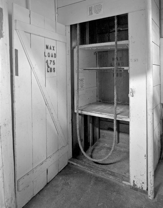 The dumb waiter at the second floor laundry and storerooms is functional and used regularly to supply the kitchen and housekeeping above.